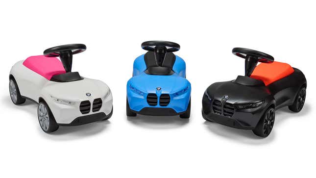 Image of three BMW Baby Racer toy cars. 